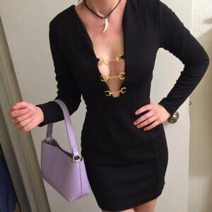 elegant black dress with V front and gold rings